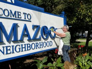 City beautification isn't always flowers. Sometimes it's sprucing up the Welcome to Kalamazoo Neighborhood sign on N Westnedge Ave.